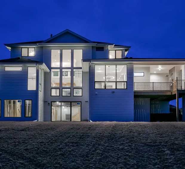 Exterior of a custom home at dusk