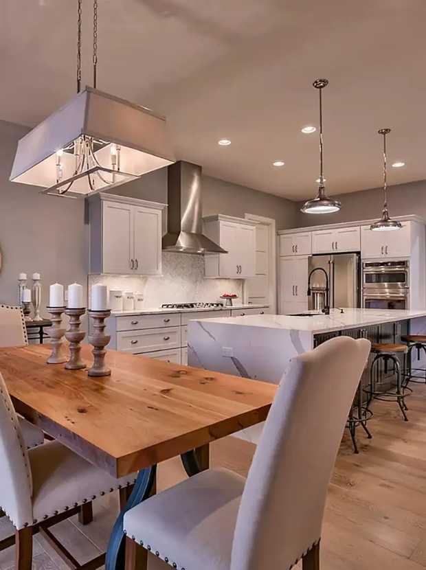Kitchen with a large island and wood countertop