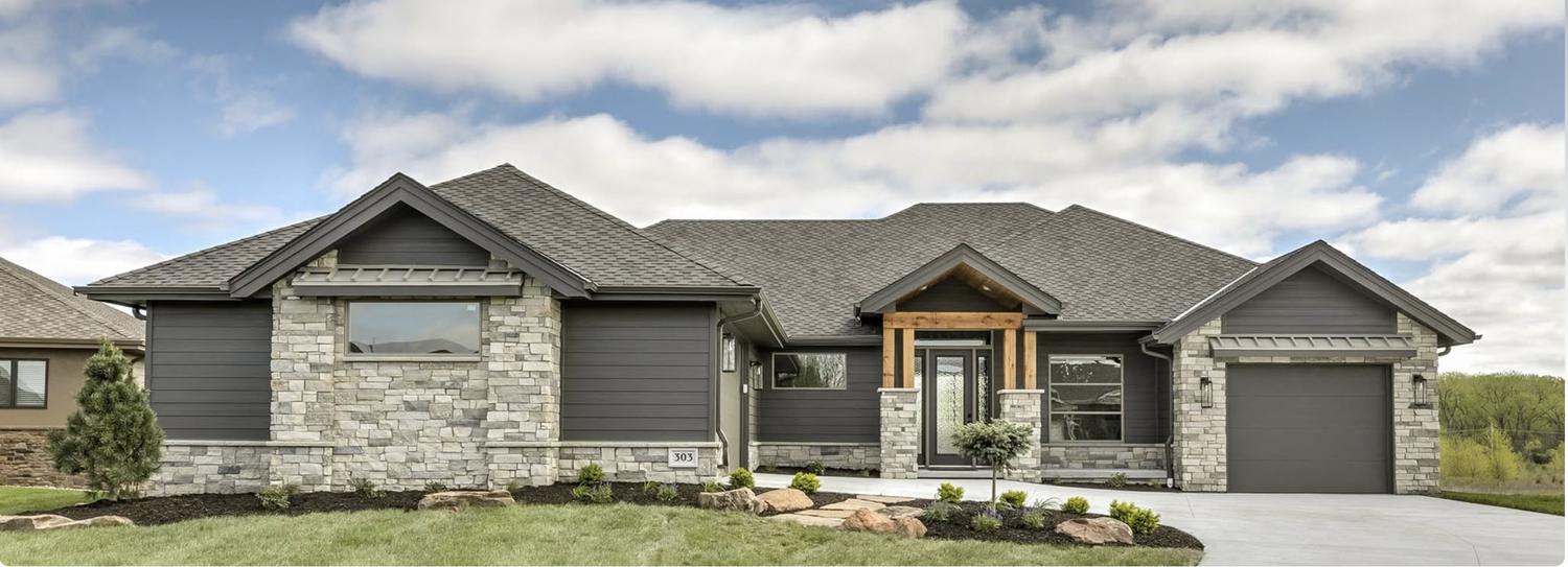 A ranch-style home with a stone and timber entry